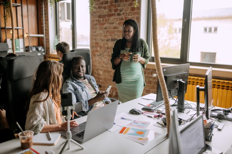 Colleagues working together in the office